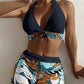 👙 60% DE RÉDUCTION 🌿 Maillot de bain 2 pièces col licou décolleté en V – Motif feuilles & coupe flatteuse – 5 couleurs, tailles S-XL – parfait pour l’été, la plage ou la piscine 🏖️✨