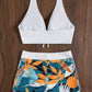 👙 60% DE RÉDUCTION 🌿 Maillot de bain 2 pièces col licou décolleté en V – Motif feuilles & coupe flatteuse – 5 couleurs, tailles S-XL – parfait pour l’été, la plage ou la piscine 🏖️✨