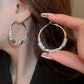 Boucles d'oreilles circulaires avec zircon