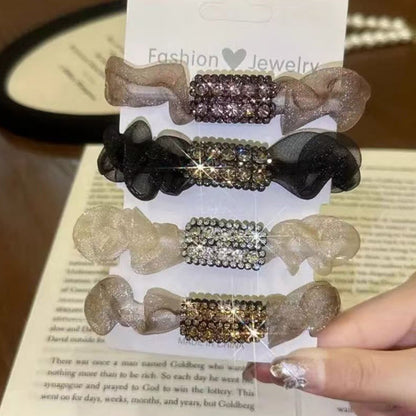 💎 Lot de 4 élastiques à cheveux élégants ornés de strass – Chic & scintillant ✨ 🎀 -50 % pour une touche glamour au quotidien !