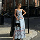 👗 50% DE RÉDUCTION 🌸 Robe sans manches col V à imprimé floral avec fente – Fluide, légère & parfaite pour les journées chaudes – élégante et décontractée ☀️