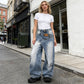 👖 60% DE RÉDUCTION 💙 Jean femme taille asymétrique jambe large – Coupe 3D, lavage décoloré & silhouette ultra large – Tailles S-2XL – idéal streetwear ou mode affirmée ✨
