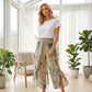 👖 50% DE RÉDUCTION 🌸 Pantalon à jambes larges taille haute à imprimé floral pour femme – Tissu fluide & léger – Parfait pour l’été, la plage ou un look bohème chic – confortable et élégant ✨
