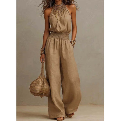👗 50% DE RÉDUCTION 🌸 Combinaison élégante à dos nu & col licou – Tissu fluide & coupe chic – Parfaite pour les soirées, les mariages ou les vacances – confortable et féminine ✨💃🌿