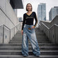 👖 60% DE RÉDUCTION 💙 Jean femme taille asymétrique jambe large – Coupe 3D, lavage décoloré & silhouette ultra large – Tailles S-2XL – idéal streetwear ou mode affirmée ✨