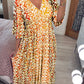 🌸 50 % de Réduction 🔥 Robe à fleurs à col en V – Élégante, légère & parfaite pour les journées ensoleillées 👗